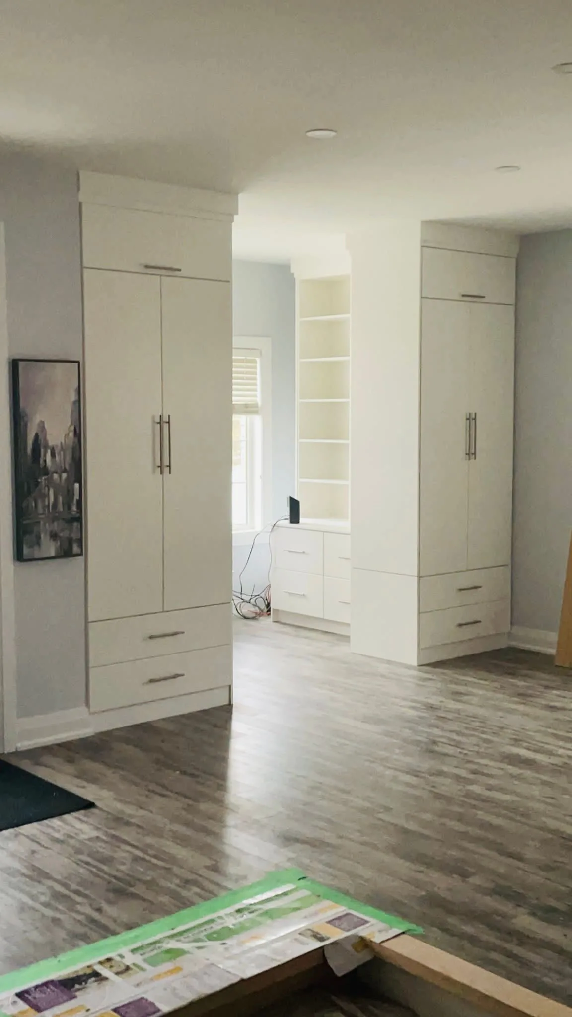 Tall custom closet cabinetry