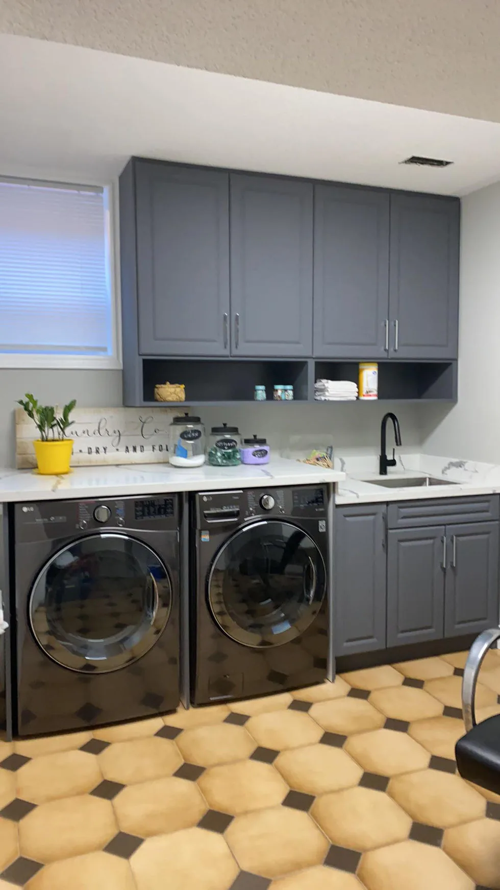 Grey laundry cabinetry