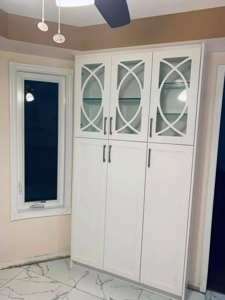 Custom vanity storage with glass doors